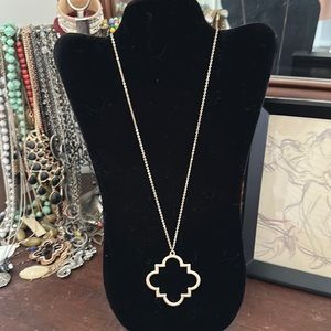 Long gold necklace